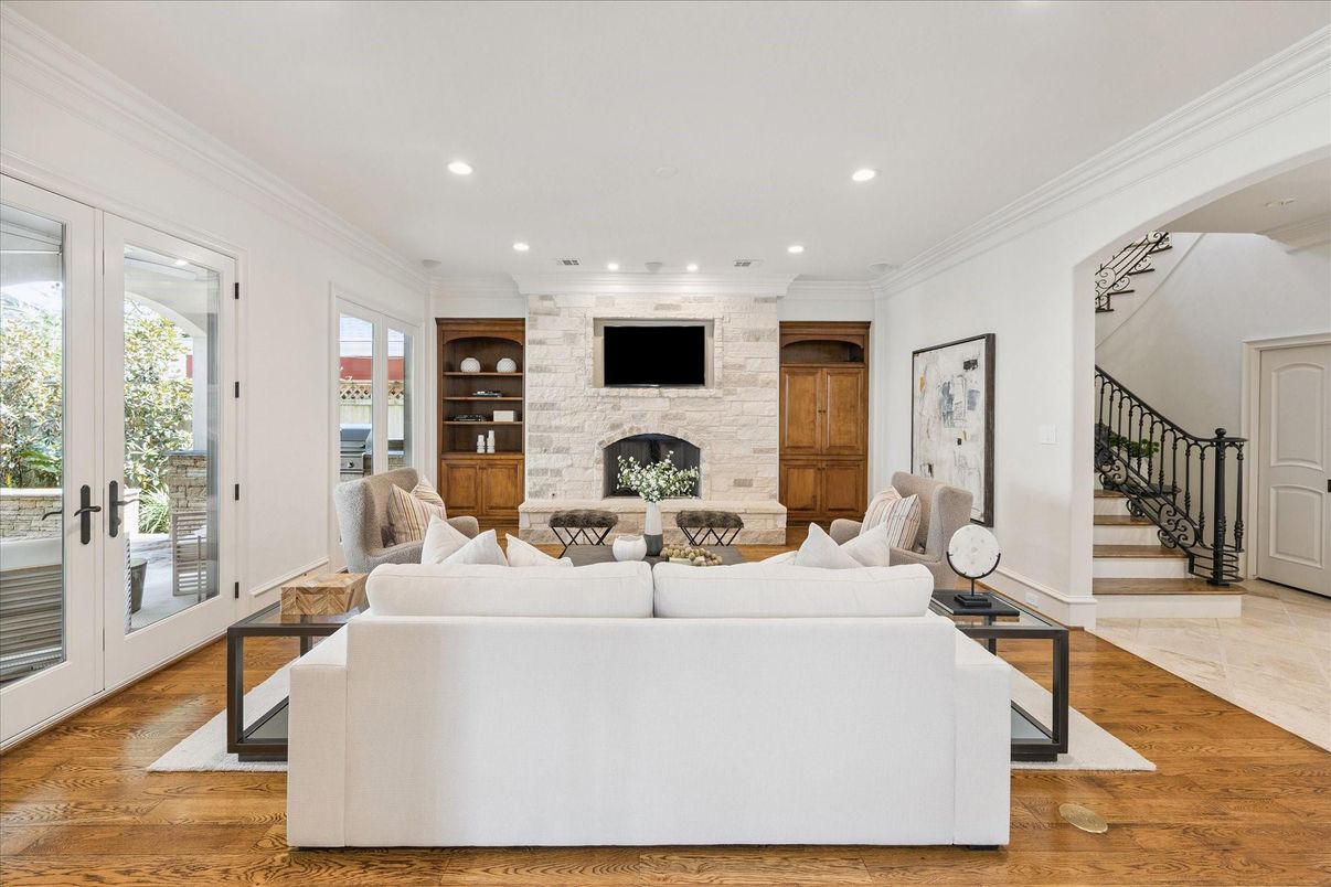 Fireplace, Interior, Living room, Recessed Lighting, Stone Walls, Wood Texture Flooring