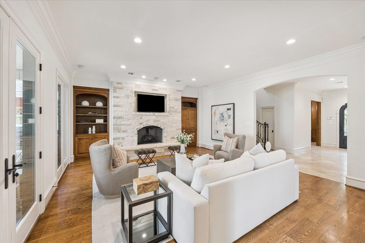 Fireplace, Interior, Living room, Recessed Lighting, Stone Walls, Wood Texture Flooring