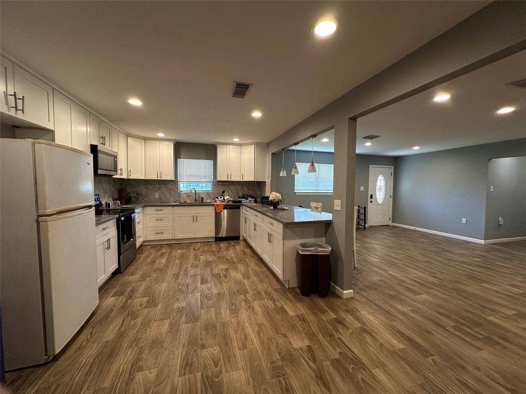 Interior, Kitchen, Recessed Lighting, Stainless Steel Appliances, Wood Texture Flooring