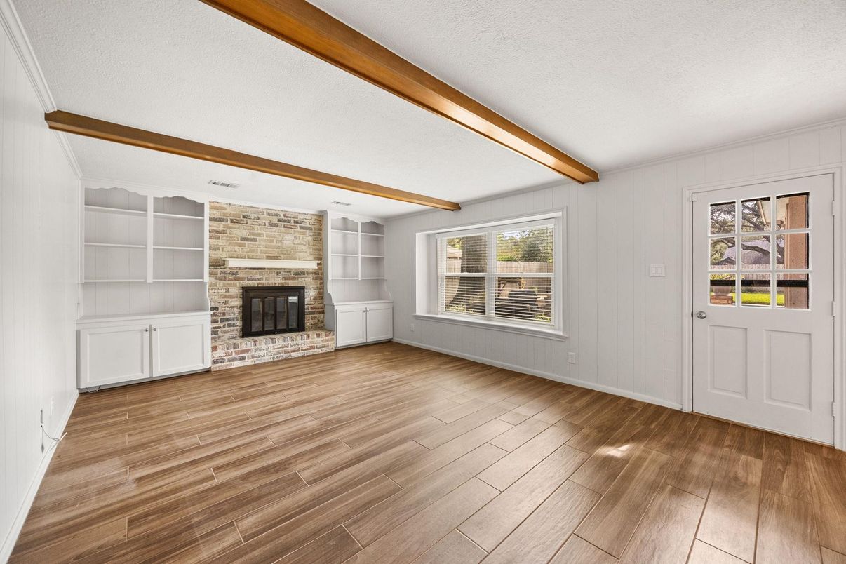Empty room, Fireplace, Interior, Stone Walls, Wooden Beams, Wood Texture Flooring