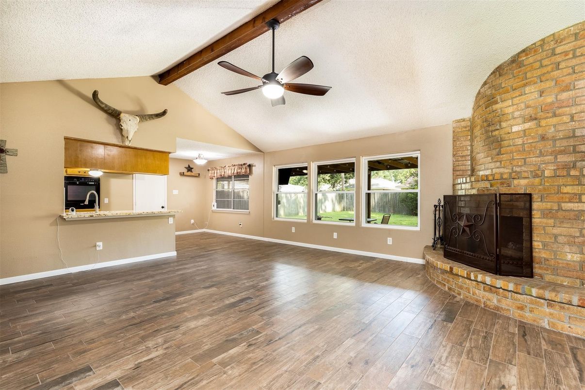 Empty room, Fireplace, Interior, Kitchen, Stone Walls, Wooden Beams, Wood Texture Flooring