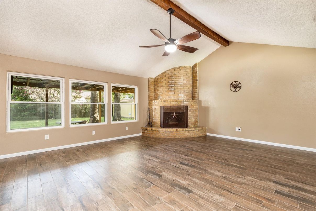 Empty room, Fireplace, Interior, Stone Walls, Wooden Beams, Wood Texture Flooring