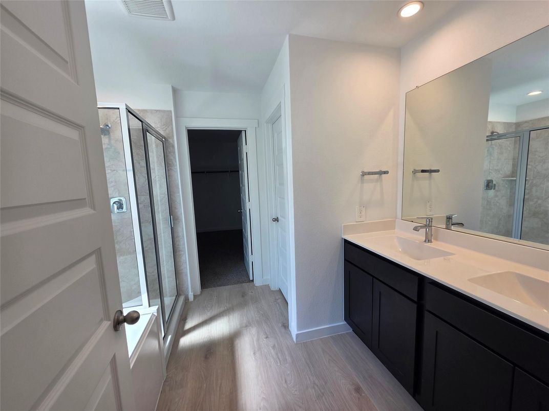 Bathroom, Dual Sink Vanities, Interior, Recessed Lighting, Wood Texture Flooring