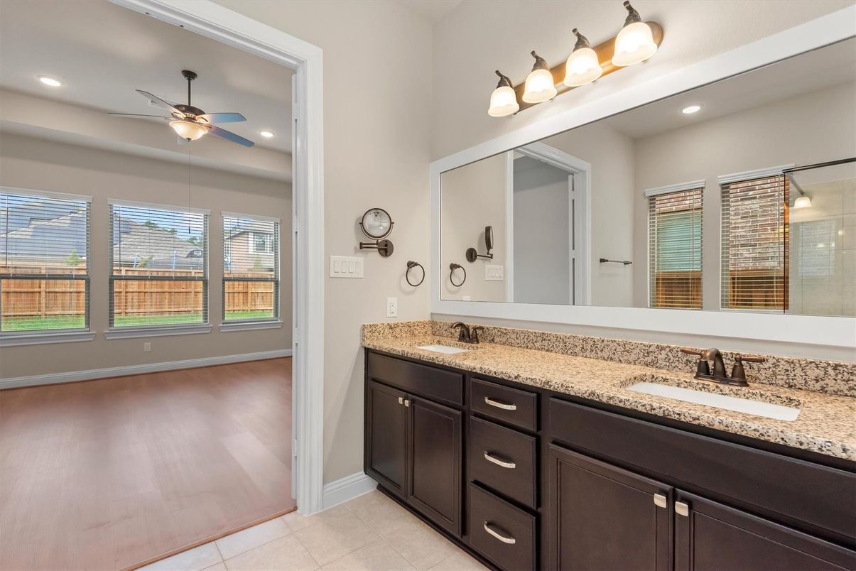 Bathroom, Dual Sink Vanities, Interior, Recessed Lighting, Wood Texture Flooring
