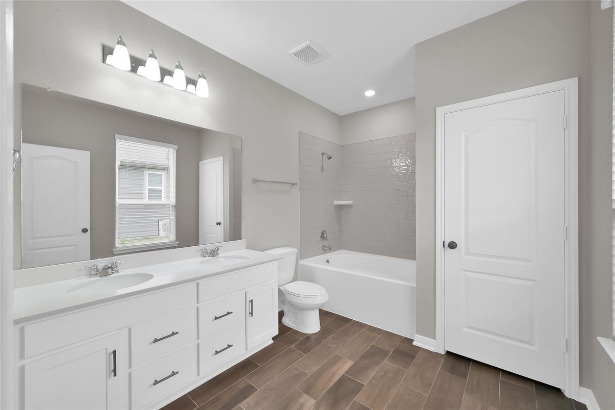 Bathroom, Dual Sink Vanities, Interior, Recessed Lighting, Wood Texture Flooring