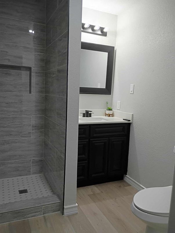 Bathroom, Glass Shower, Interior, Wood Texture Flooring