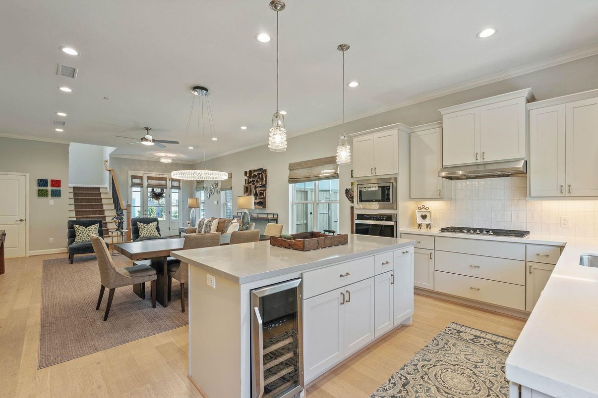 Dining room, Interior, Kitchen, Pendant Lights, Recessed Lighting, Stainless Steel Appliances, Wood Texture Flooring