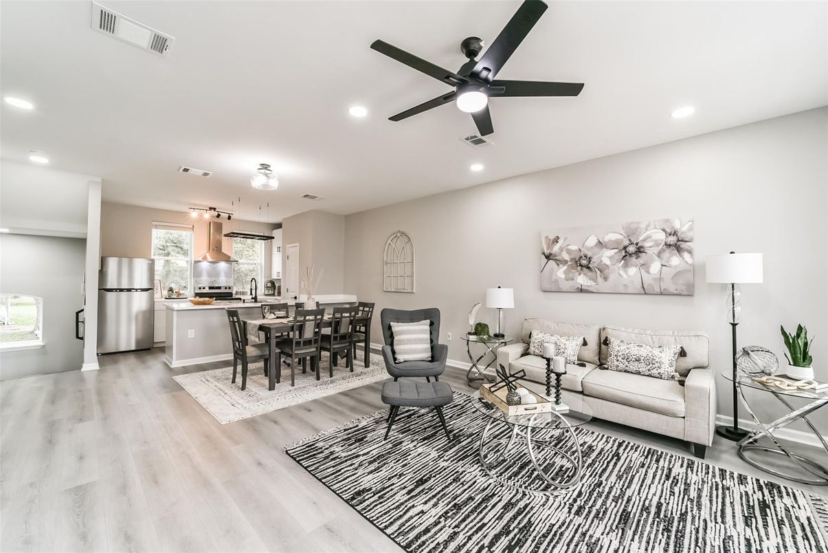 Dining room, Interior, Kitchen, Living room, Recessed Lighting, Stainless Steel Appliances, Wood Texture Flooring