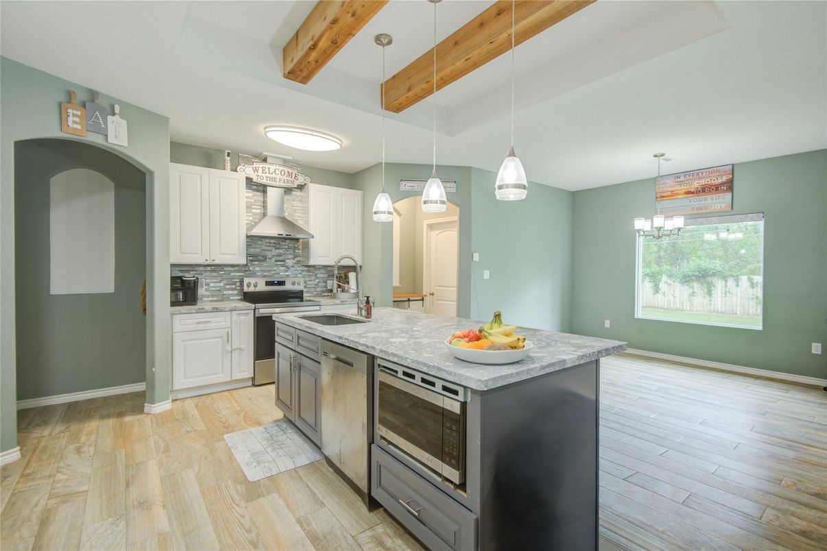 Chandelier, Interior, Kitchen, Pendant Lights, Stainless Steel Appliances, Wooden Beams, Wood Texture Flooring
