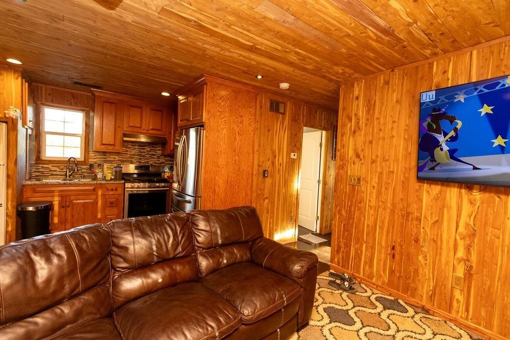 Interior, Kitchen, Living room, Recessed Lighting, Stainless Steel Appliances, Wooden Ceilings, Wooden Walls