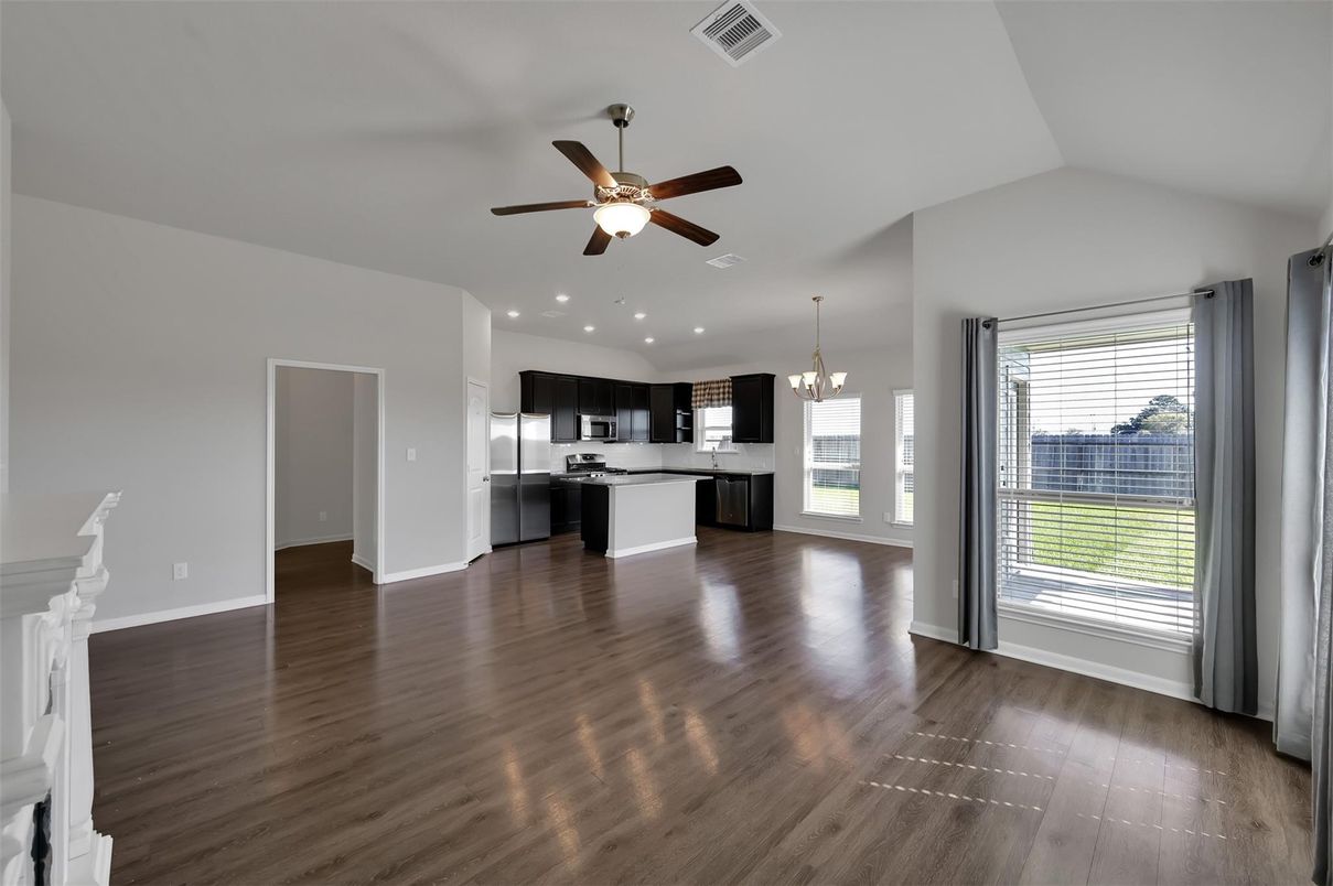 Chandelier, Empty room, Interior, Kitchen, Pendant Lights, Recessed Lighting, Stainless Steel Appliances, Wood Texture Flooring