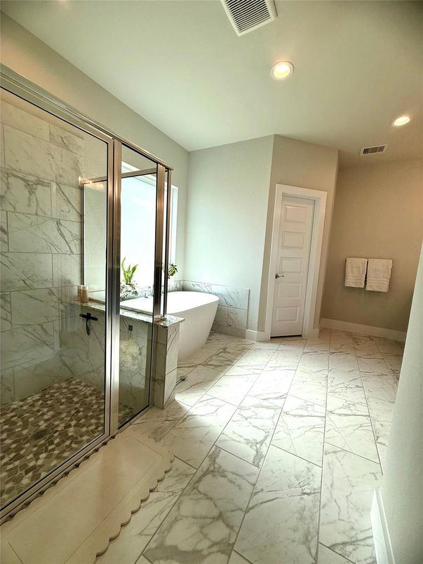 Bathroom, Free Standing Baths, Glass Shower, Interior, Marble, Marble Walls, Recessed Lighting