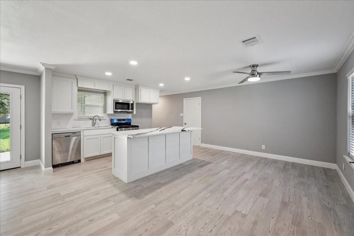 Interior, Kitchen, Recessed Lighting, Stainless Steel Appliances, Wood Texture Flooring