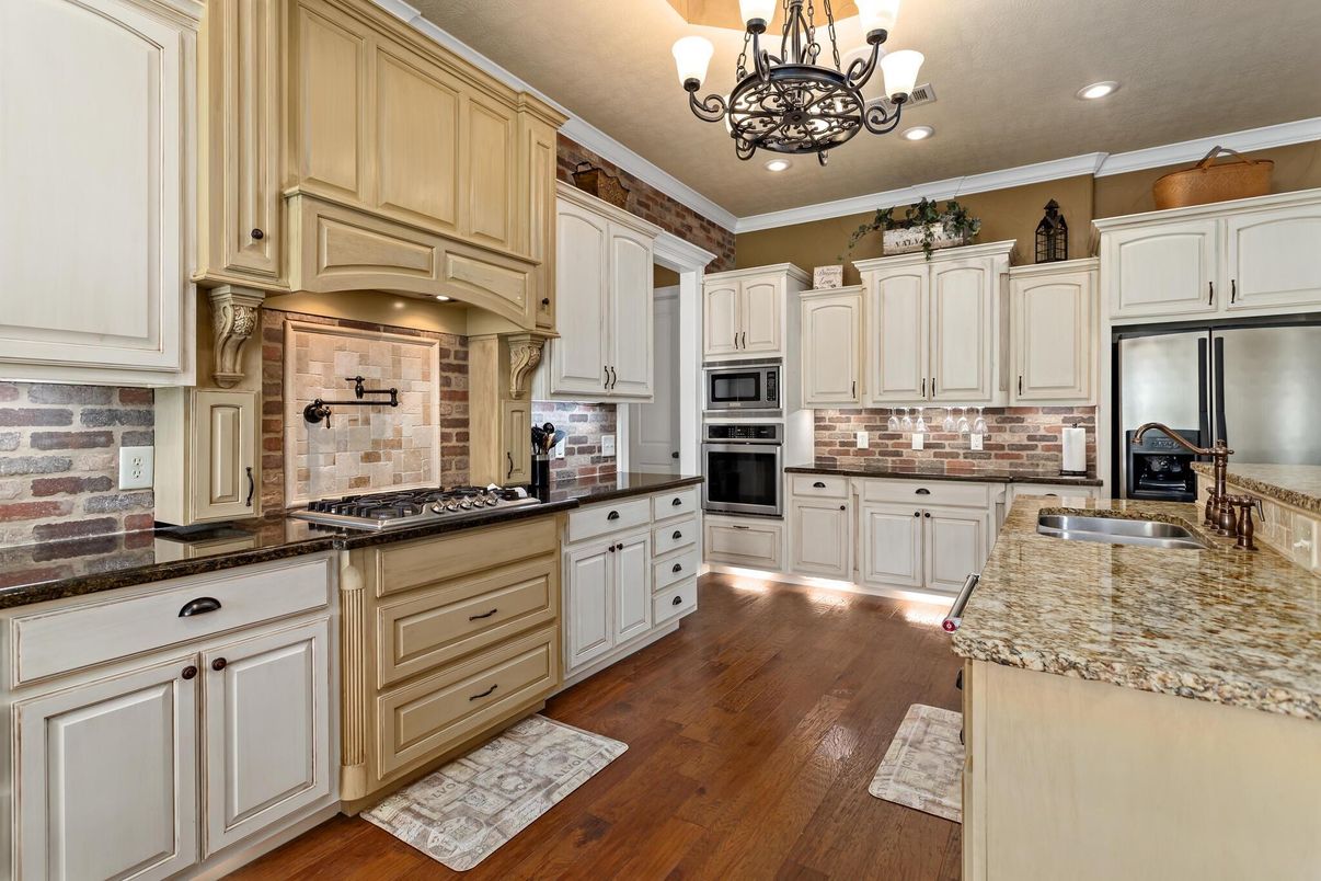 Chandelier, Interior, Kitchen, Recessed Lighting, Stainless Steel Appliances, Wood Texture Flooring