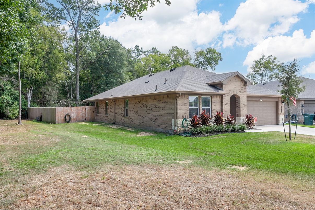 Attached, Backyard, Exterior, Facade, Brick Facade, None