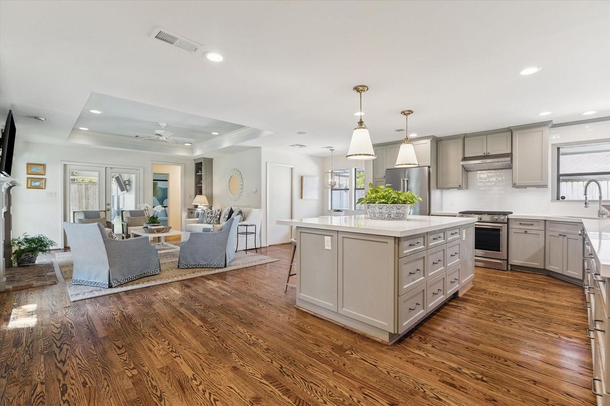 Dining room, Interior, Kitchen, Living room, Pendant Lights, Recessed Lighting, Stainless Steel Appliances, Wood Texture Flooring