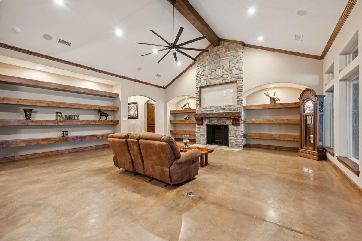 Fireplace, Interior, Living room, Pendant Lights, Recessed Lighting, Stone Walls, Wooden Beams