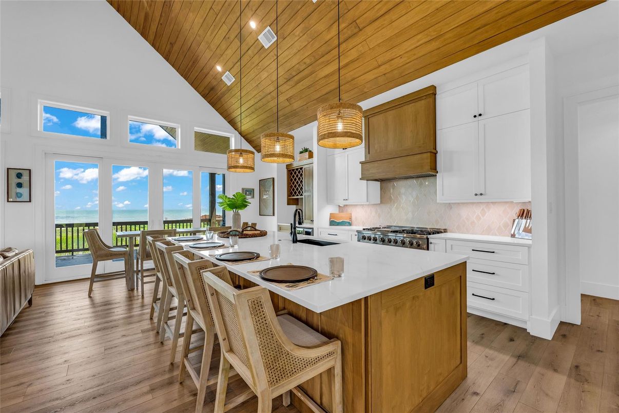 Dining room, Interior, Kitchen, Pendant Lights, Recessed Lighting, Water, Wooden Ceilings, Wood Texture Flooring