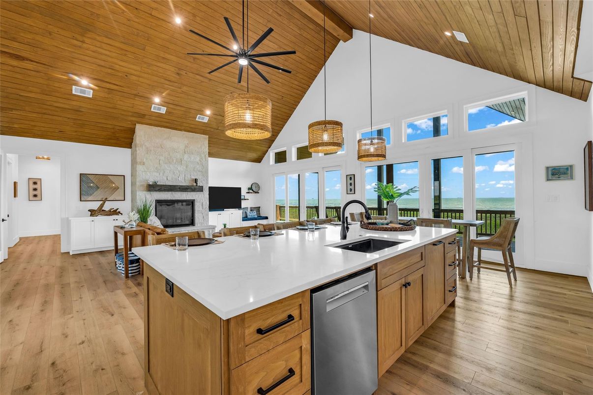 Fireplace, Interior, Kitchen, Pendant Lights, Recessed Lighting, Water, Wooden Ceilings, Wood Texture Flooring