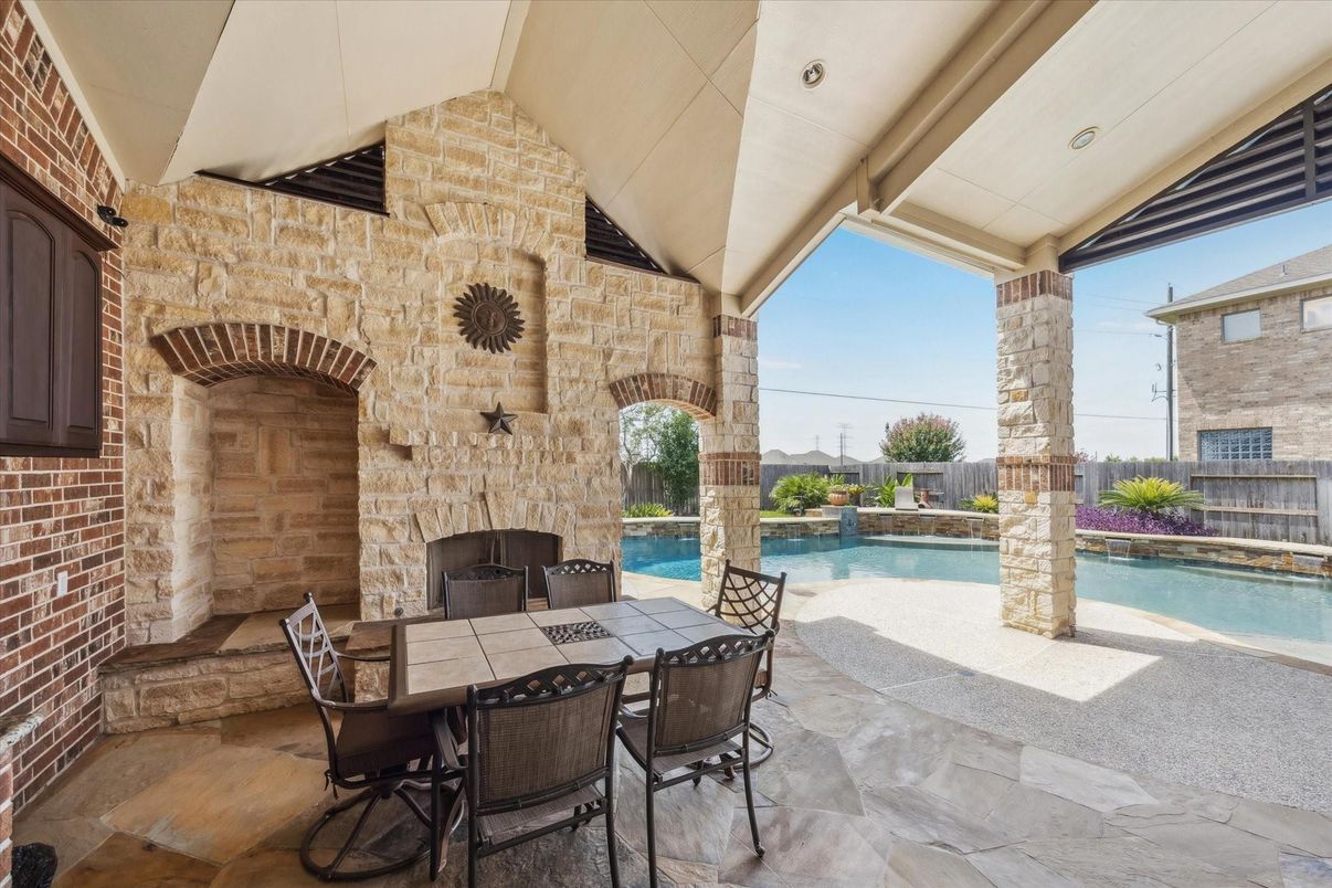 Exterior, Fireplace, Pool