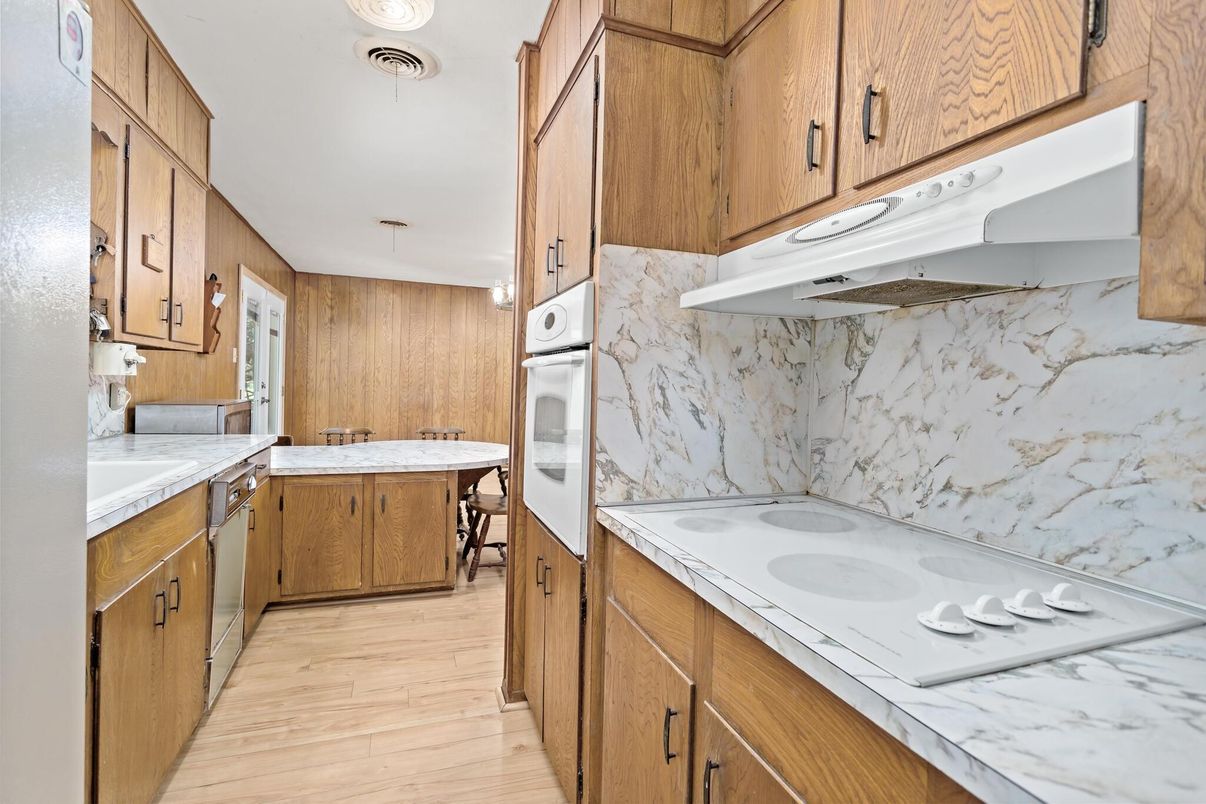 Interior, Kitchen, Marble Walls, Tile Countertops, Wood Texture Flooring