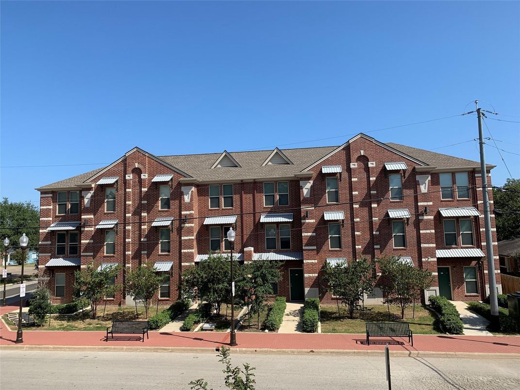 Exterior, Facade, Brick Facade, Condo Building