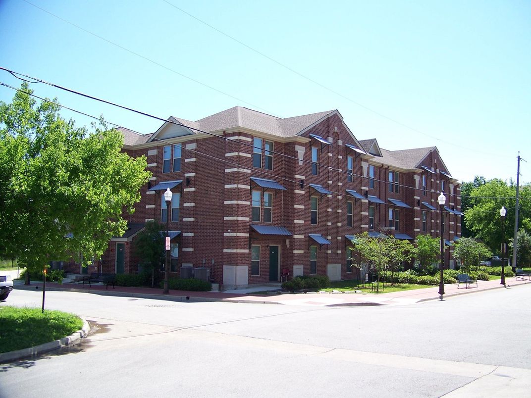 Exterior, Facade, Brick Facade, Condo Building