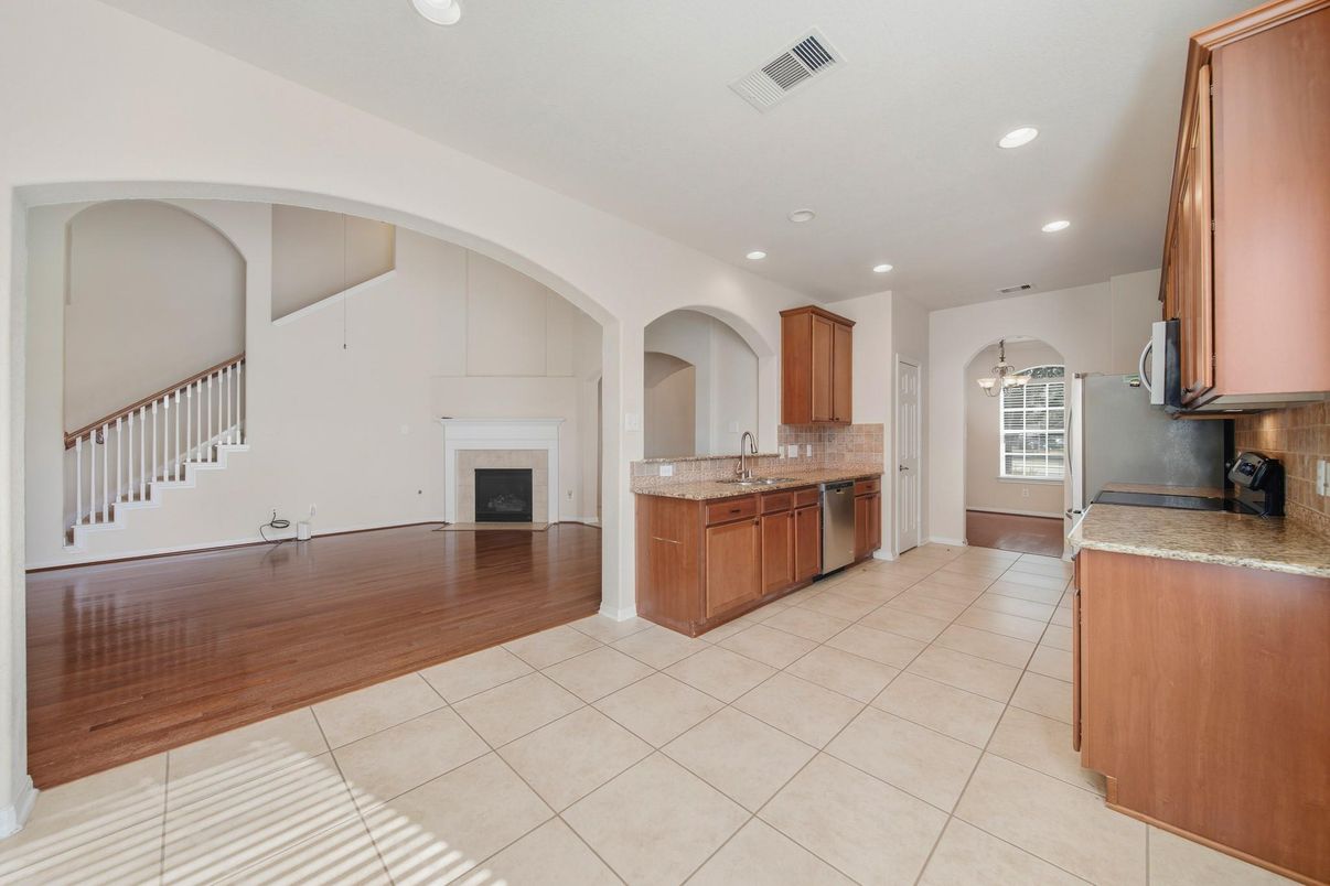 Fireplace, Interior, Kitchen, Recessed Lighting, Wood Texture Flooring