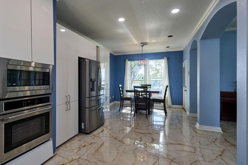 Dining room, Interior, Kitchen, Marble, Pendant Lights, Recessed Lighting, Stainless Steel Appliances