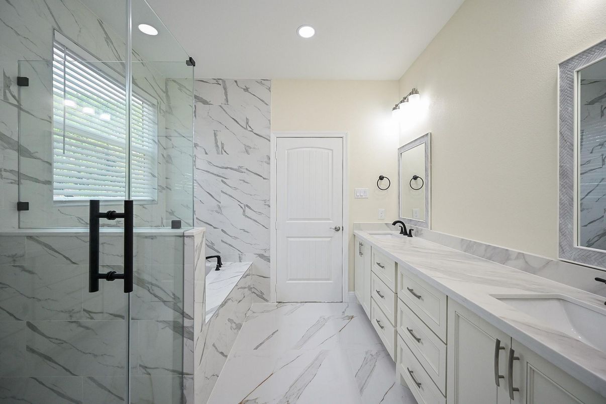 Bathroom, Dual Sink Vanities, Glass Shower, Interior, Marble, Marble Walls, Recessed Lighting