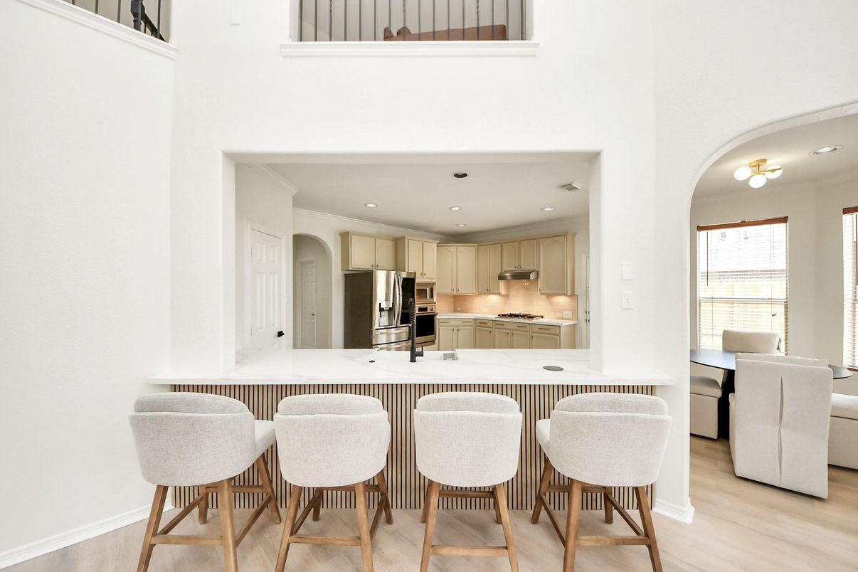 Dining room, Interior, Kitchen, Recessed Lighting, Stainless Steel Appliances, Wood Texture Flooring