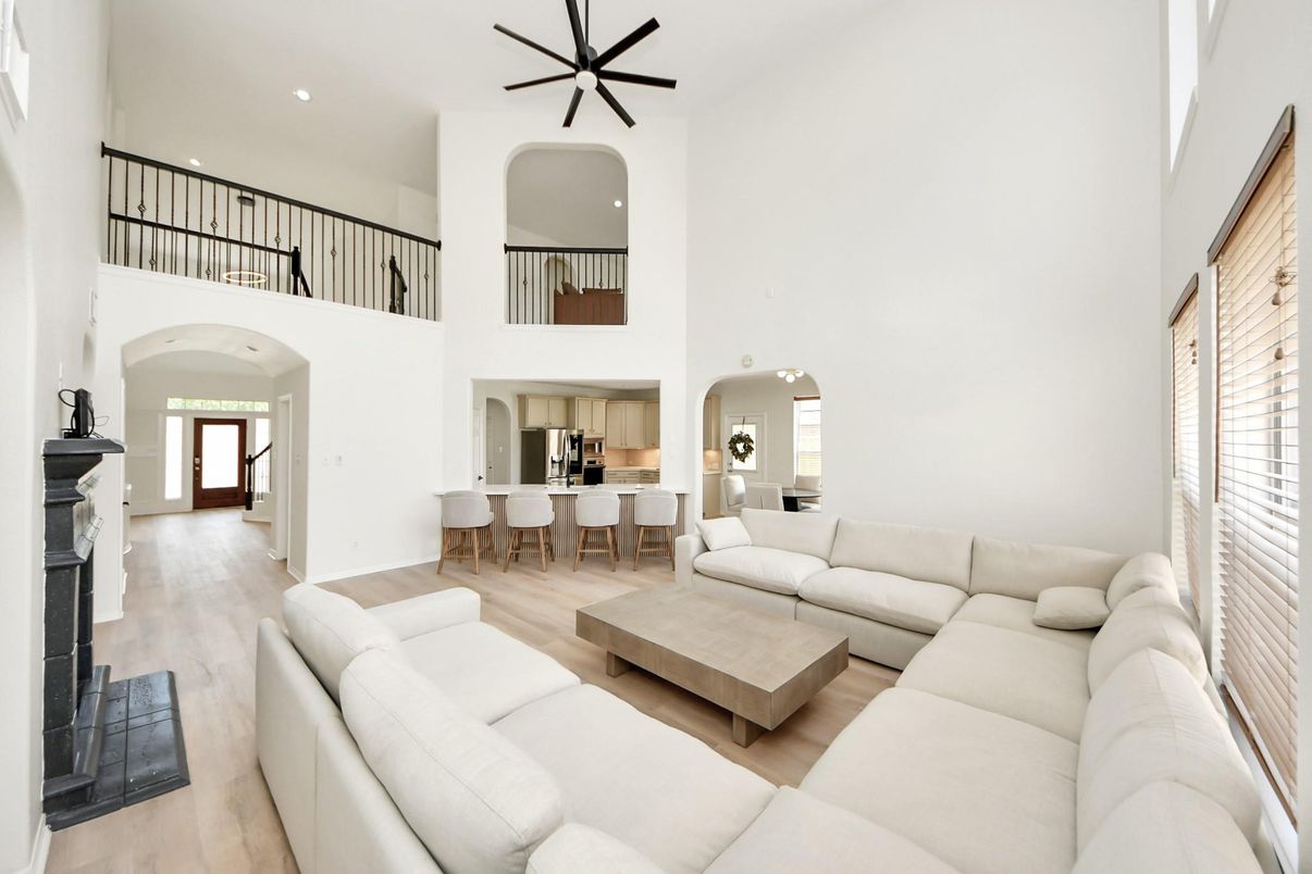 Dining room, Fireplace, Interior, Living room, Pendant Lights, Recessed Lighting, Wood Texture Flooring
