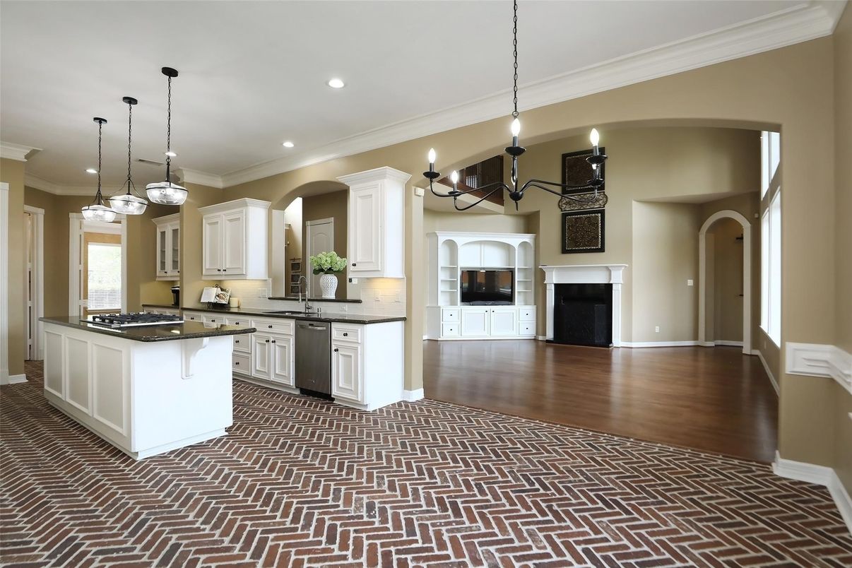 Chandelier, Fireplace, Interior, Kitchen, Pendant Lights, Recessed Lighting, Wood Texture Flooring