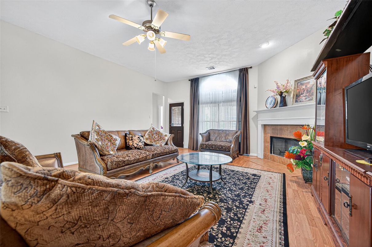 Fireplace, Interior, Living room, Recessed Lighting, Wood Texture Flooring