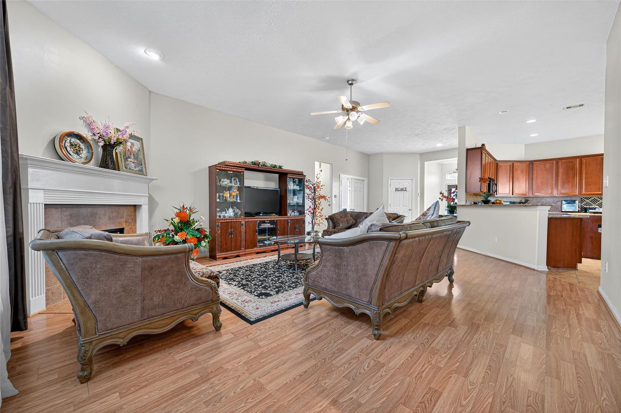 Fireplace, Interior, Kitchen, Living room, Recessed Lighting, Wood Texture Flooring