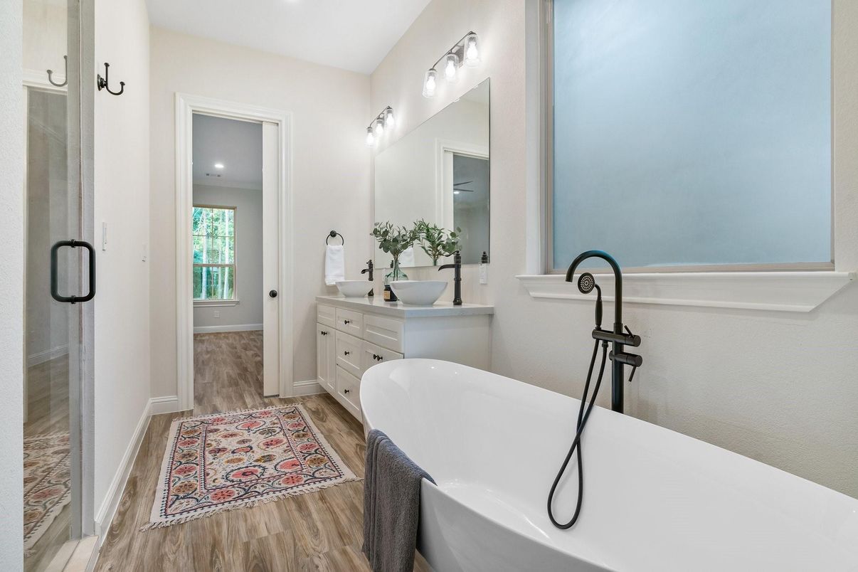 Bathroom, Dual Sink Vanities, Free Standing Baths, Glass Shower, Interior, Recessed Lighting, Wood Texture Flooring