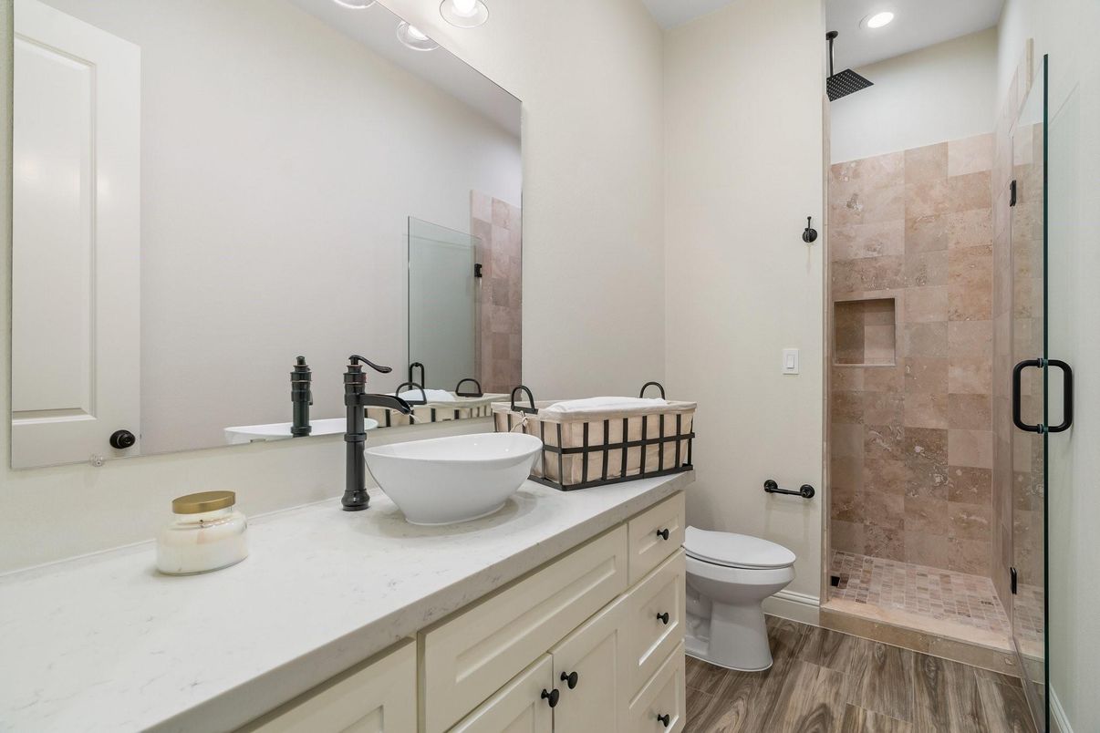 Bathroom, Dual Sink Vanities, Glass Shower, Interior, Recessed Lighting, Wood Texture Flooring