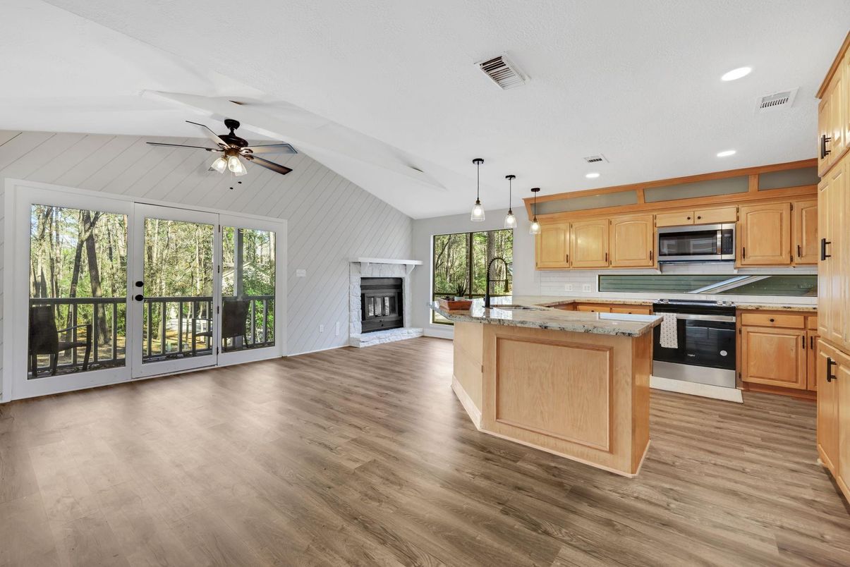 Empty room, Fireplace, Interior, Kitchen, Pendant Lights, Recessed Lighting, Wood Texture Flooring