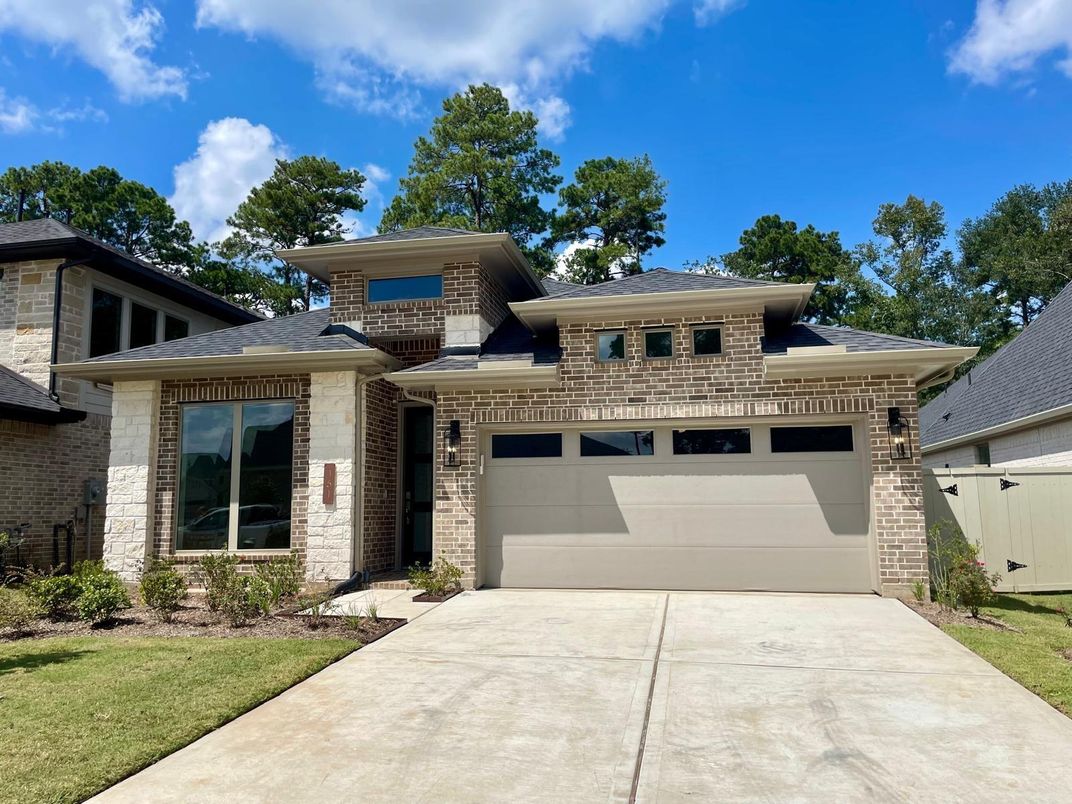 Attached, Exterior, Facade, Brick Facade, Modern