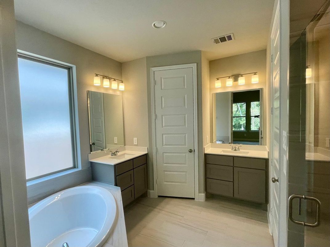 Bathroom, Dual Sink Vanities, Glass Shower, Interior, Recessed Lighting, Wood Texture Flooring