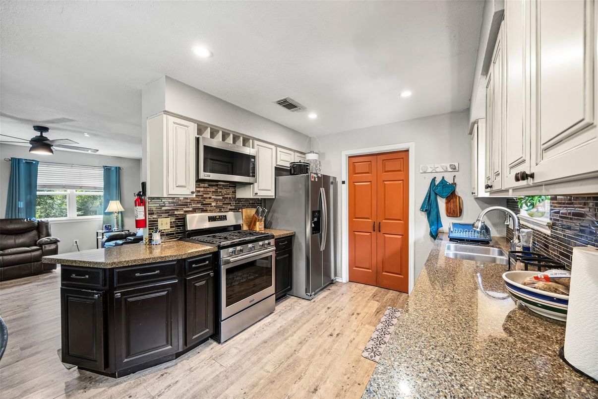 Interior, Kitchen, Recessed Lighting, Stainless Steel Appliances, Wood Texture Flooring