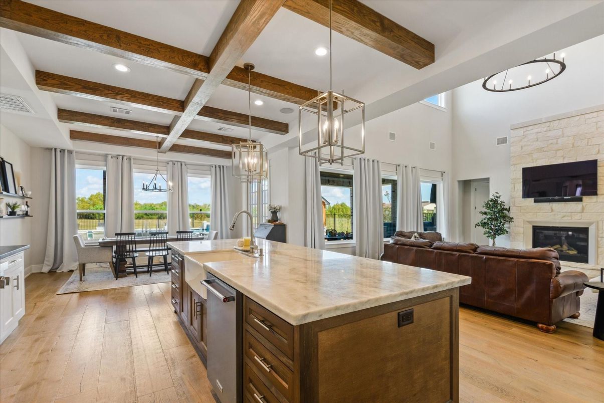 Dining room, Fireplace, Interior, Kitchen, Living room, Pendant Lights, Recessed Lighting, Stone Walls, Wooden Beams, Wood Texture Flooring