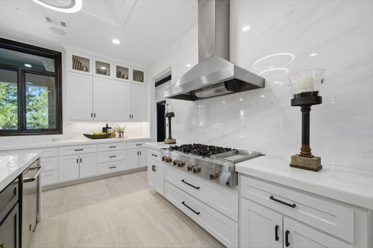 Interior, Kitchen, Marble Walls, Recessed Lighting, Stainless Steel Appliances