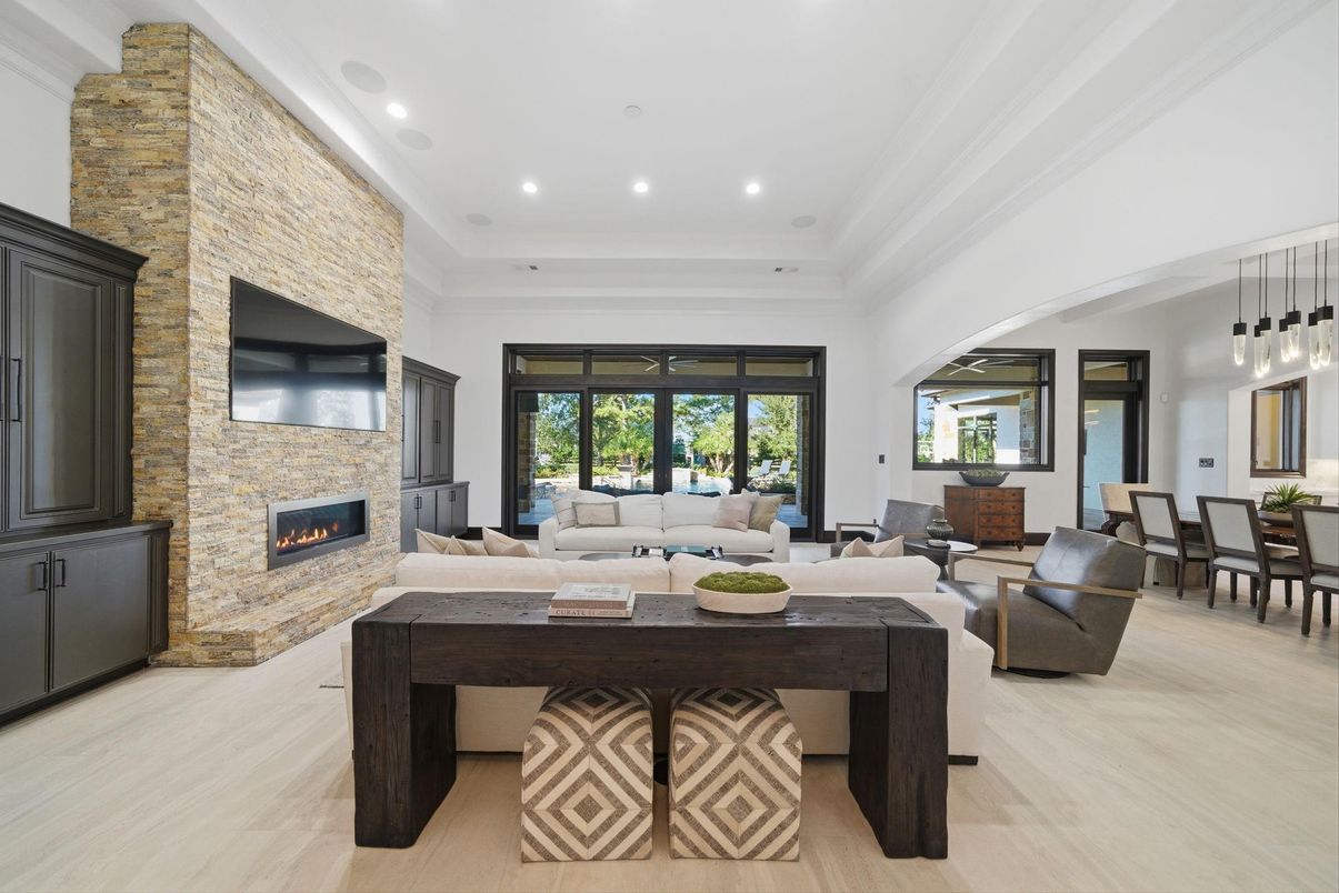 Dining room, Fireplace, Interior, Living room, Pendant Lights, Recessed Lighting, Stone Walls, Wood Texture Flooring