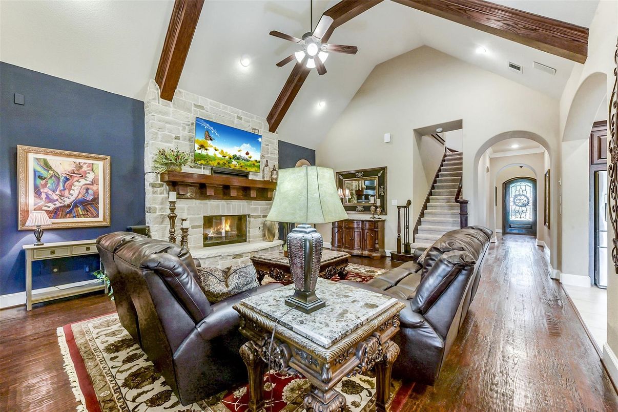 Fireplace, Interior, Living room, Recessed Lighting, Stone Walls, Wooden Beams, Wood Texture Flooring