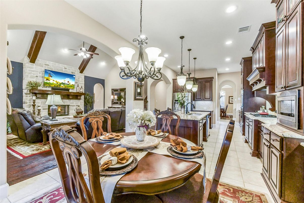 Chandelier, Dining room, Fireplace, Interior, Kitchen, Living room, Pendant Lights, Recessed Lighting, Stone Walls