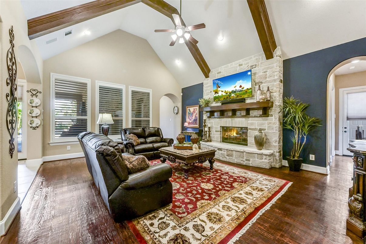 Fireplace, Interior, Living room, Recessed Lighting, Stone Walls, Wooden Beams, Wood Texture Flooring