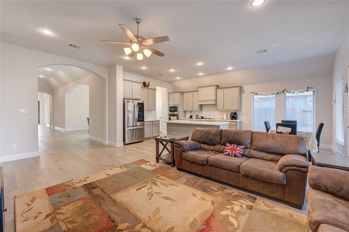 Dining room, Interior, Kitchen, Living room, Recessed Lighting, Stainless Steel Appliances, Wood Texture Flooring