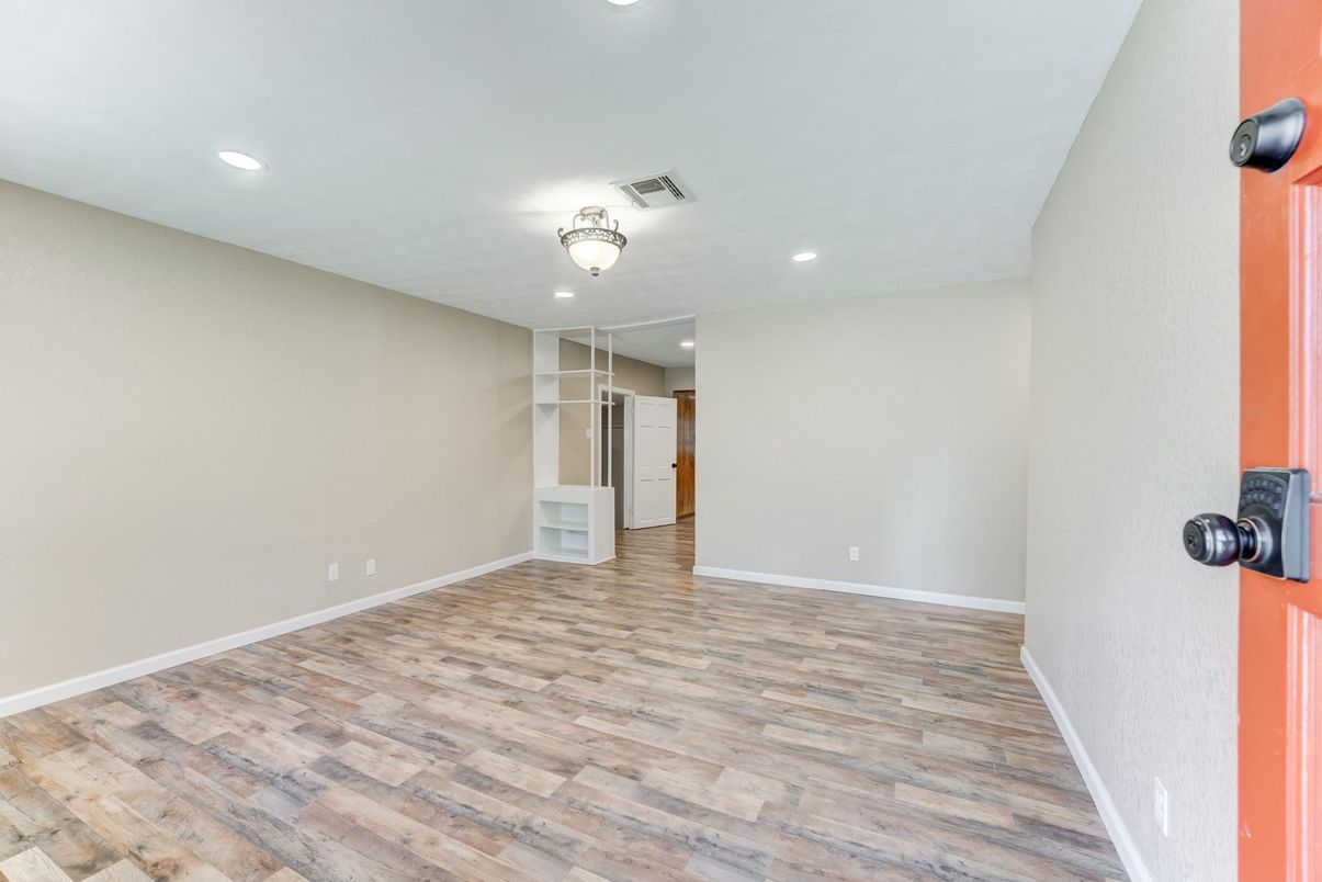 Empty room, Fireplace, Interior, Recessed Lighting, Wood Texture Flooring