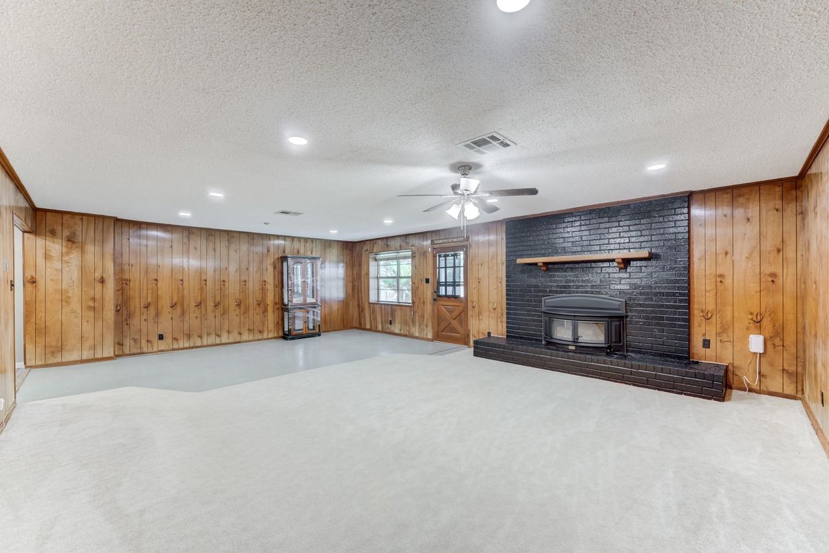 Empty room, Fireplace, Interior, Recessed Lighting, Stone Walls, Wooden Walls